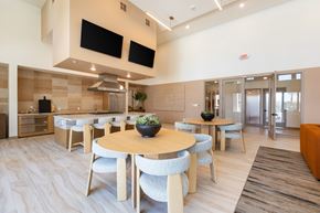 Las Vegas apartment for rent - A modern dining area with a round table and chairs.