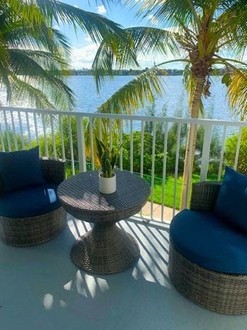 A furnished patio overlooking the water