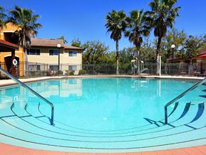 Tampa apartment for rent - Pool with lounge chairs at Bristol Bay, Tampa, FL