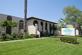 Spring Valley apartment for rent - Building exterior with grass and sign