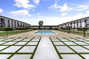 El Cajon apartment for rent - Pool area with decorative grass and pavers 