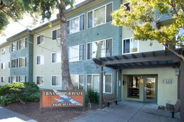 Alameda apartment for rent - a building with a sign in front of it