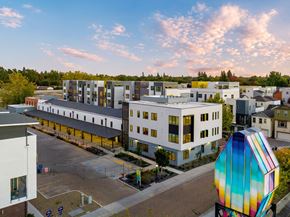 Sacramento apartment for rent - Upper Land Park, Sacramento, CA Apartments - Market Club At The Mill - Building Exterior With Street View Of Complex And View Of Sky