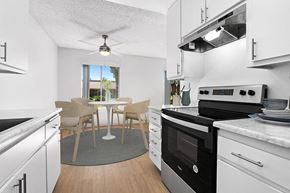 Spring Valley apartment for rent - Kitchen with appliances and wood floors