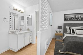 Spring Valley apartment for rent - Bedroom with bathroom and wood floors
