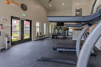 The gym at the flats at big tex apartments