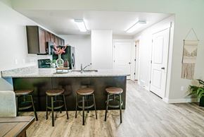 Roy townhouse for rent - a view of a dining room with a table and chairs at Arcadia Townhomes, Roy, 84067