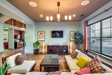 San Marcos apartment for rent - A living room with a white couch and a wooden coffee table.