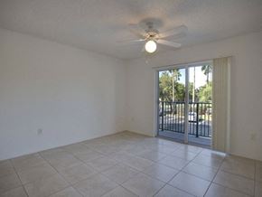 Doral apartment for rent - Living room with patio door at Doral Terrace, Doral, FL