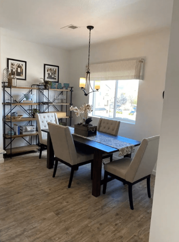 Luxury simulated hardwood plank at entry, kitchen, laundry and baths