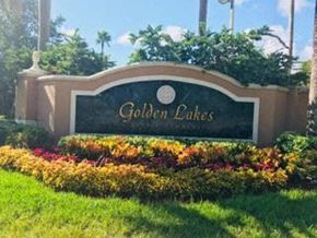 Miami apartment for rent - Property monument sign in grass at Golden Lakes, Miami, FL