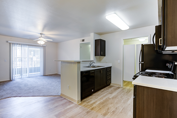 Roseville apartment for rent - A kitchen area with a counter and cabinets.