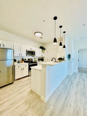 El Paso apartment for rent - Kitchen with stainless steel appliances and white cabinets