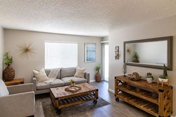 Sparks apartment for rent - a living room with a couch and a coffee table