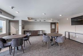 Arlington apartment for rent - table and chairs with TV