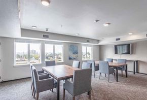 Arlington apartment for rent - table and chairs with TV