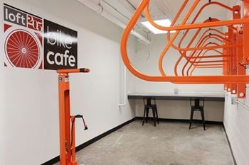 A bike cafe with orange pipes