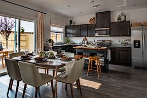 Reno apartment for rent - a kitchen and dining room with a table and chairs