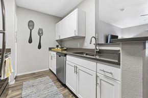 Cottonwood Heights apartment for rent - a kitchen with white cabinets and a sink at Ascent Apartments, Cottonwood Heights, 84121