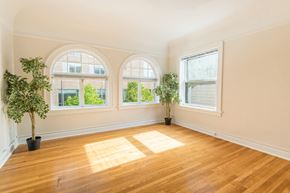 Portland apartment for rent - A room with wooden floors and two potted plants.at Palladian Apartments, Portland, OR 97201 ? 