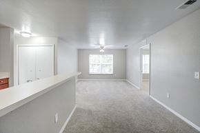 Titusville apartment for rent - Empty Living Area at PALMETTO RIDGE Apartments, TITUSVILLE, 32960