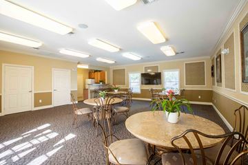 Vero Beach apartment for rent - A dining room with a round table and chairs.