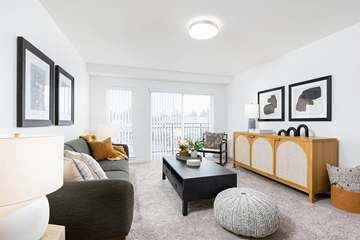 Shoreline apartment for rent - a living room with a couch and a coffee table