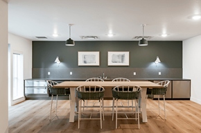 Shoreline apartment for rent - a conference room with a long wooden table and chairs at QUINN BY VINTAGE, Shoreline, WA