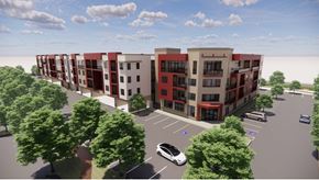 Oxnard apartment for rent - A rendering of a modern apartment complex with a parking lot in front. at Vintage at Lockwood Apartments, Oxnard, CA, 93036