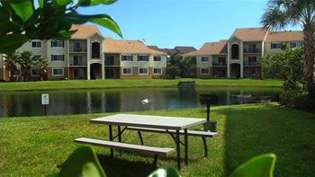 San marco community exterior with lake and picnic area
