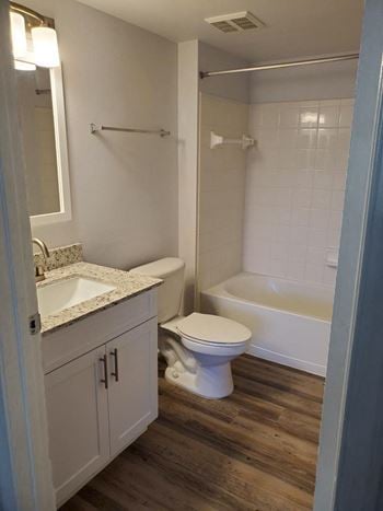 San marco apartment home bathroom with vanity and tub and shower combo