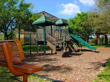 Sanctuary cove bench overlooking playground area
