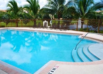 Sanctuary cove resort style pool and seating