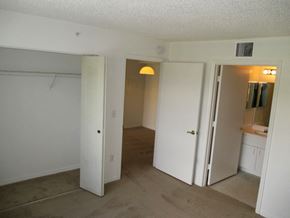 Hialeah apartment for rent - Siesta Pointe carpeted bedroom with on-suite bathroom at Siesta Pointe, Hialeah, 33015