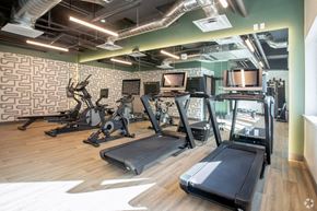 Sacramento apartment for rent - Studio Apartments in Downtown Sacramento, CA - Mod at Midtown - 24-Hour Fitness Center with Running Machines, Large Mirrors, and Plank Wood Flooring