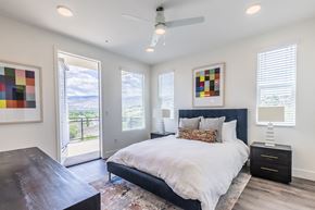 Reno townhouse for rent - The Retreat bedroom with ceiling fan and private balcony