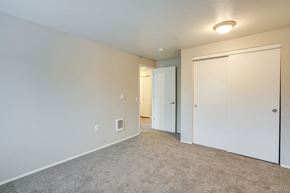 Canby apartment for rent - Apartments in Canby OR - Township - Empty Bedroom with Plush Carpet and Closet at TOWNSHIP Apartments, CANBY, Oregon