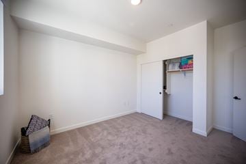Camarillo apartment for rent - a living room with white walls and carpet and a closet