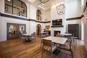 Camarillo apartment for rent - a dining room with tables and chairs and a fireplace at Vintage at Anacapa Canyon, Camarillo, California