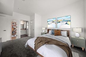 South San Francisco apartment for rent - a bedroom with a bed and two paintings on the wall at Grand and Linden Family Apartments, South San Francisco