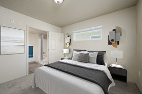 Laughlin apartment for rent - A bedroom with a large bed and a painting on the wall at VISTA CREEK Apartments, Nevada, 89029
