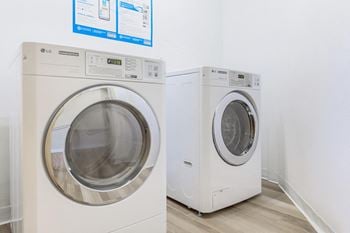 A washer and dryer in a laundry room