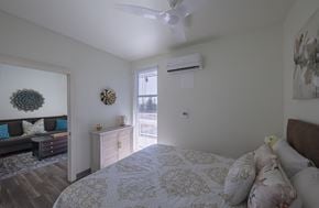 Vacaville apartment for rent - a bedroom with a bed and a ceiling fan at ROCKY HILL VETERANS HOUSING, California, 95688