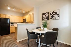 Las Vegas apartment for rent - A kitchen with a table and chairs.