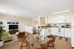 Troutdale apartment for rent - A modern kitchen with a dining table and chairs.