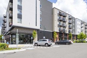 Mill Creek apartment for rent - Exterior view of building with parking at FARM BY VINTAGE, Washington