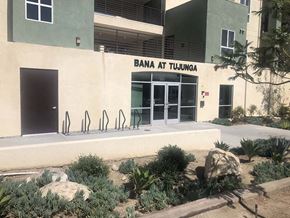 Tujunga apartment for rent - Exterior view of entrance to community with landscape 