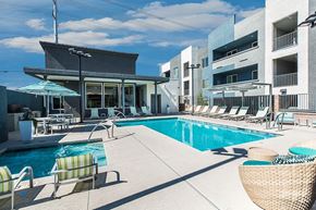 Las Vegas apartment for rent - Pool and spa with lounge chairs at THE RISE APARTMENT HOMES, Las Vegas, NV, 89139