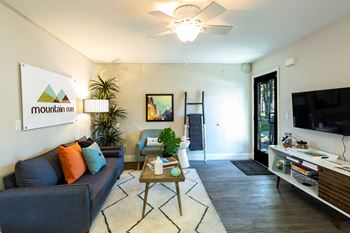 A living room with a couch and a coffee table