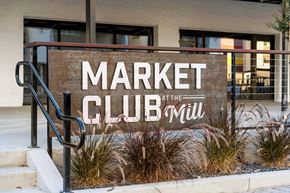 Sacramento apartment for rent - the sign for market club in front of a building